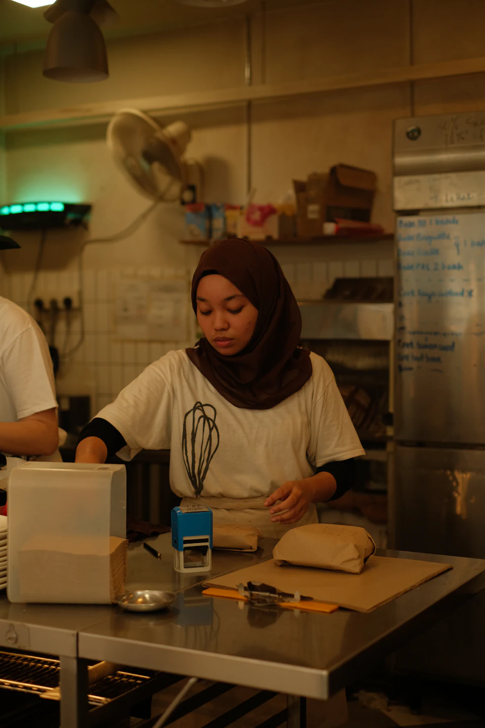 A woman working in a Kuala Lumpur bakery